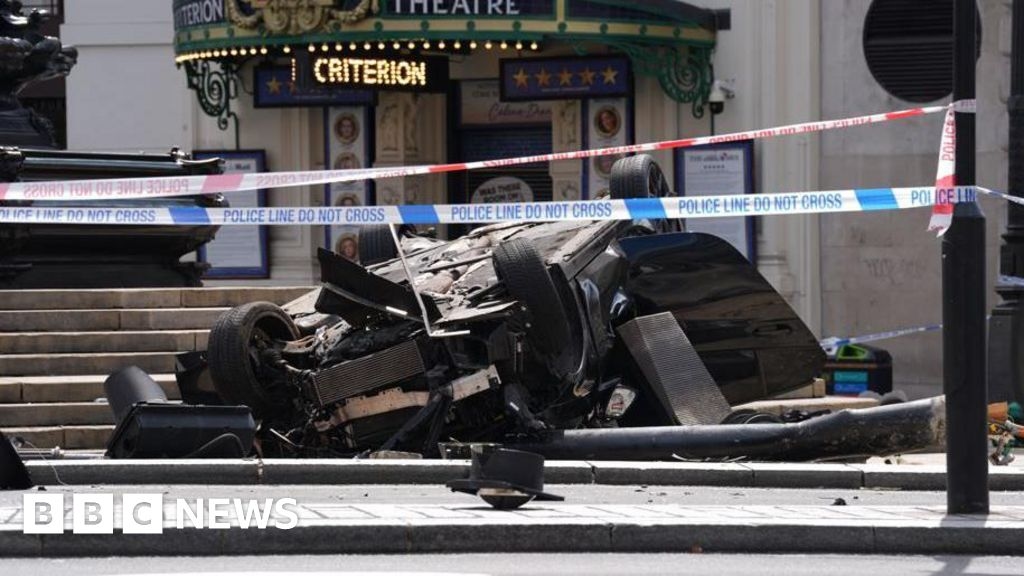 Piccadilly Circus reopens after car overturns in crash