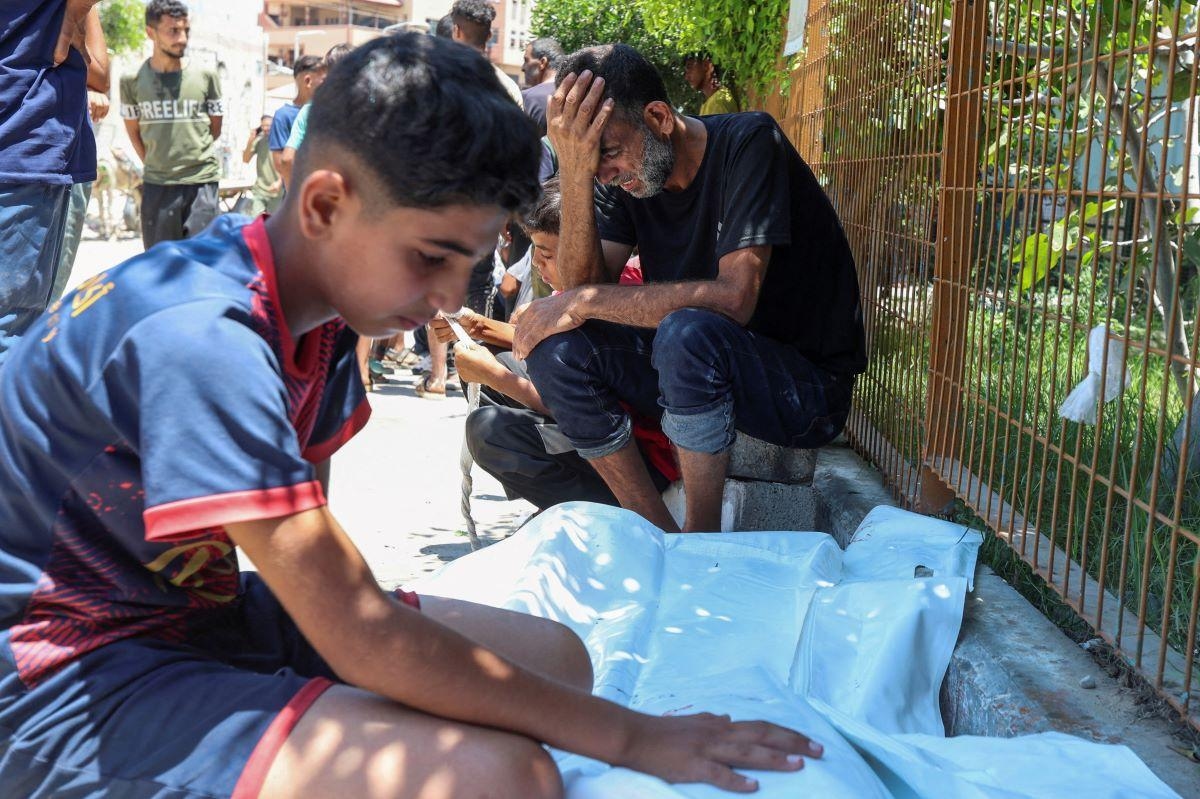 Gaza truce talks faltering over withdrawal; 17 reported killed in latest shooting near aid