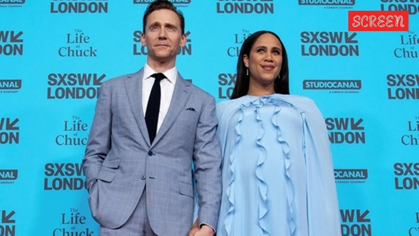 Tom Hiddleston expecting second child with wife Zawe Ashton as she debuts baby bump at the UK premiere of ‘The Life of Chuck'