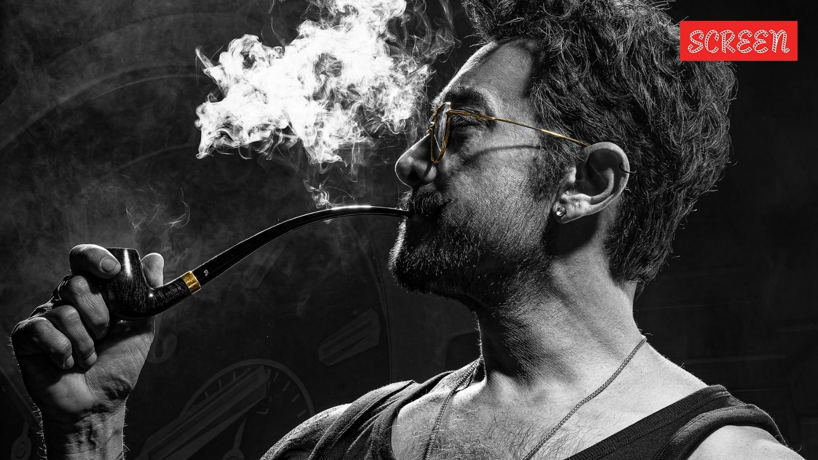 Aamir Khan flaunts tattooed biceps, smokes a pipe, and oozes swagger in Coolie, see poster