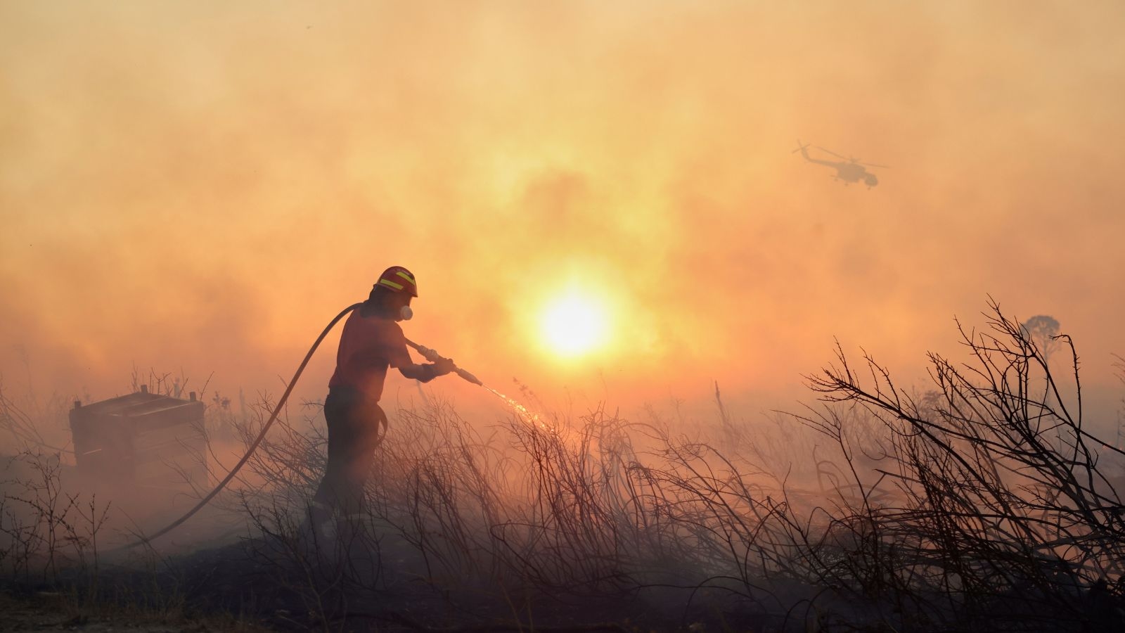 Wildfire burns through suburb of Greece's capital Athens as residents are told to evacuate