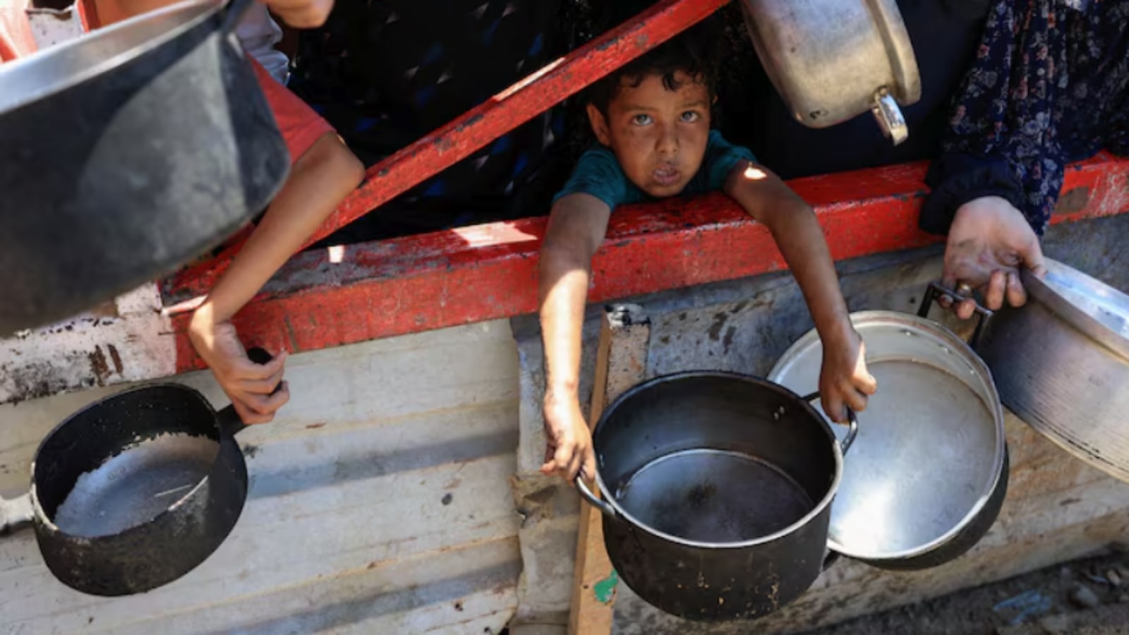 Over 100 aid agencies say Gaza at risk of mass starvation after 10 more deaths reported in a day