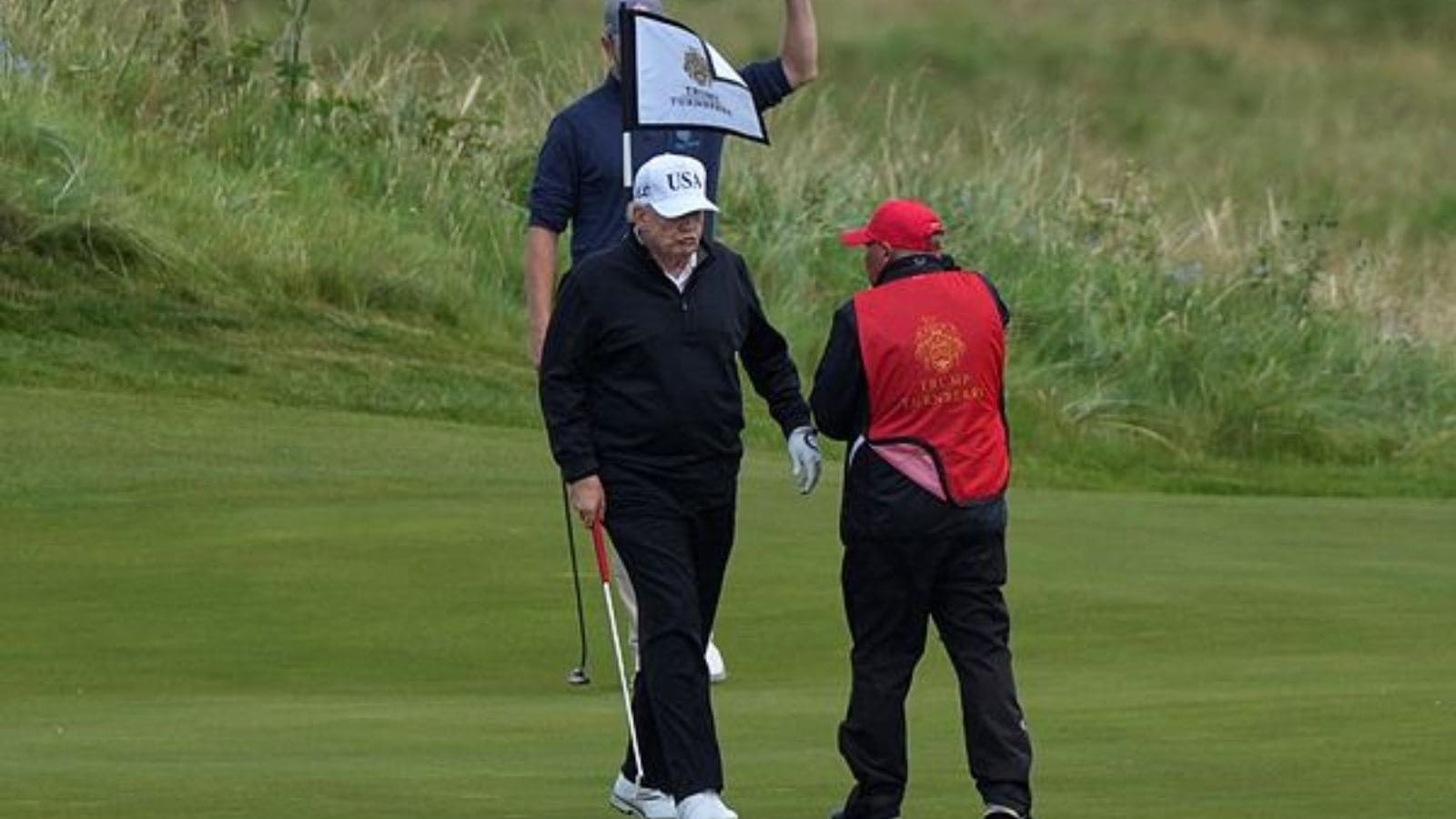 Trump plays golf in Scotland while protesters take to the streets and decry his visit