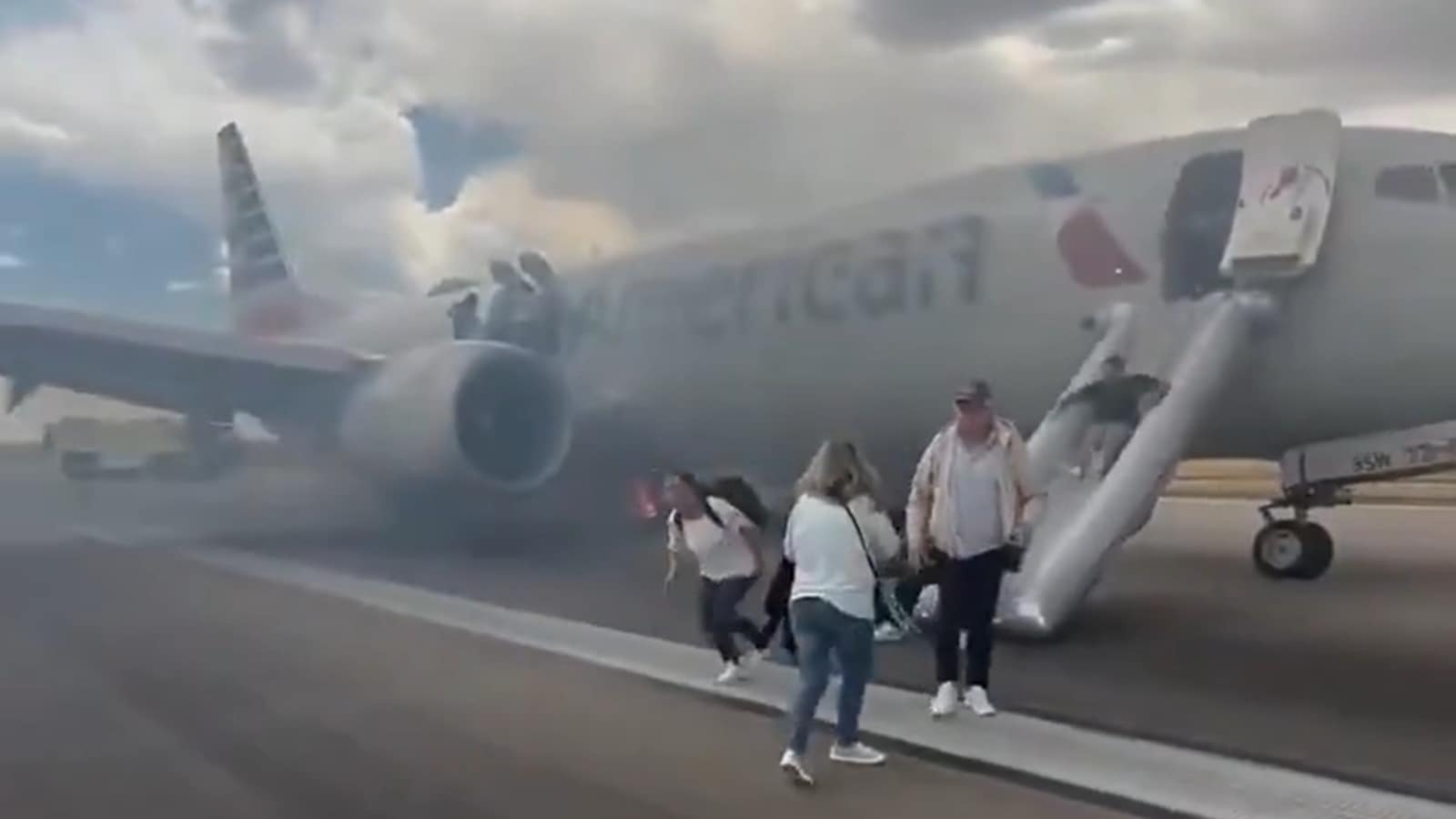 WATCH: American Airlines flight evacuated after Boeing aircraft catches fire at Denver airport