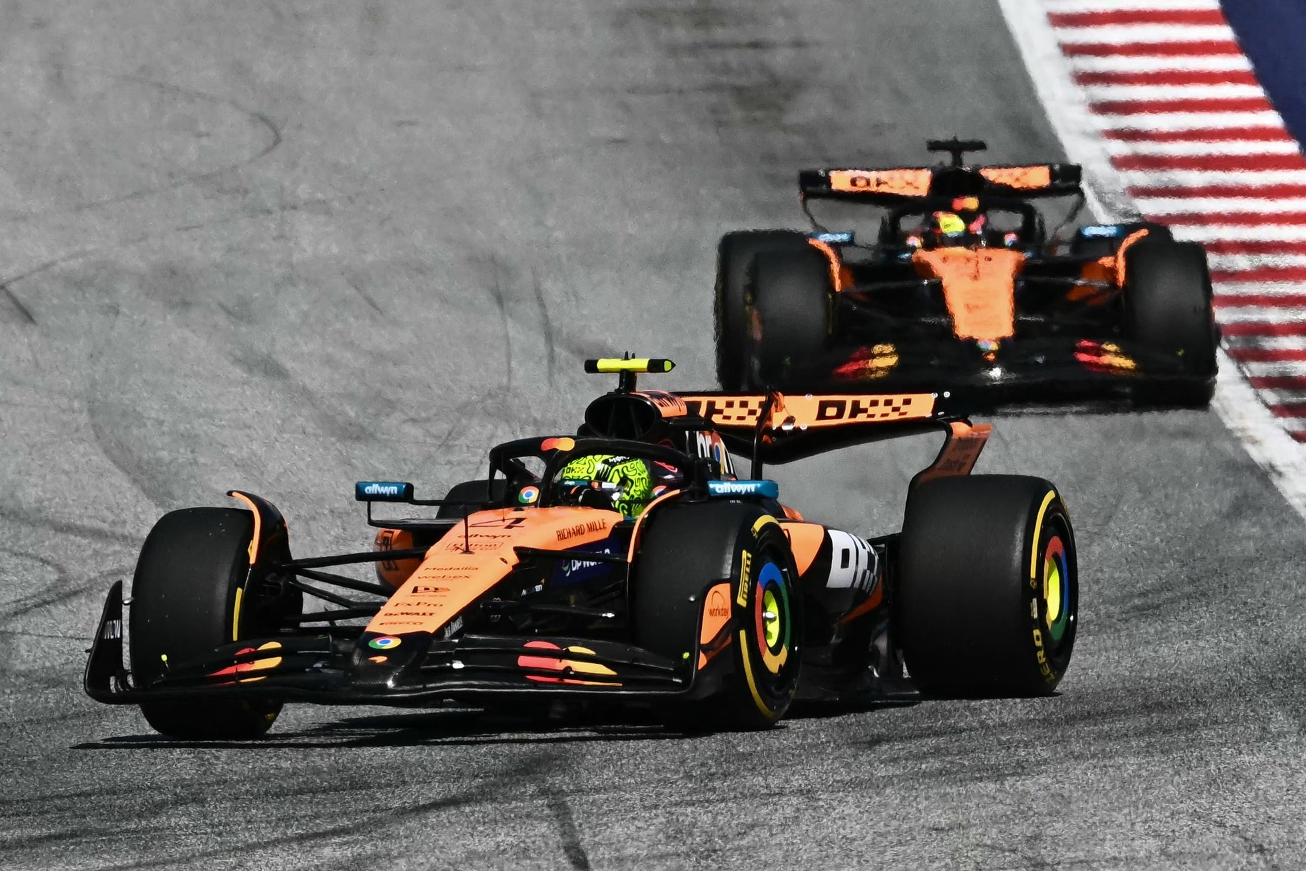 Lando Norris fights off Piastri to win in Austria