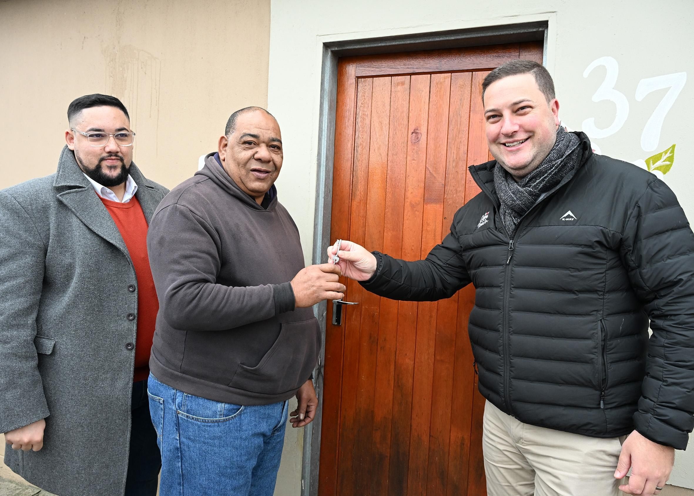 Four-year legal battle ends as Cape Town Mayor delivers homes to rightful owners
