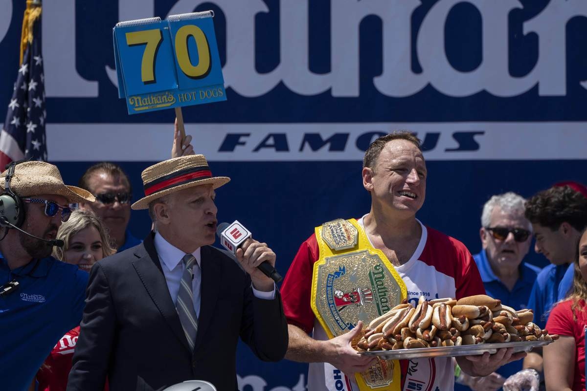 Joey Chestnut Reclaims Title in Nathan's Famous Hot Dog Eating Contest, Wins 17th Mustard Belt