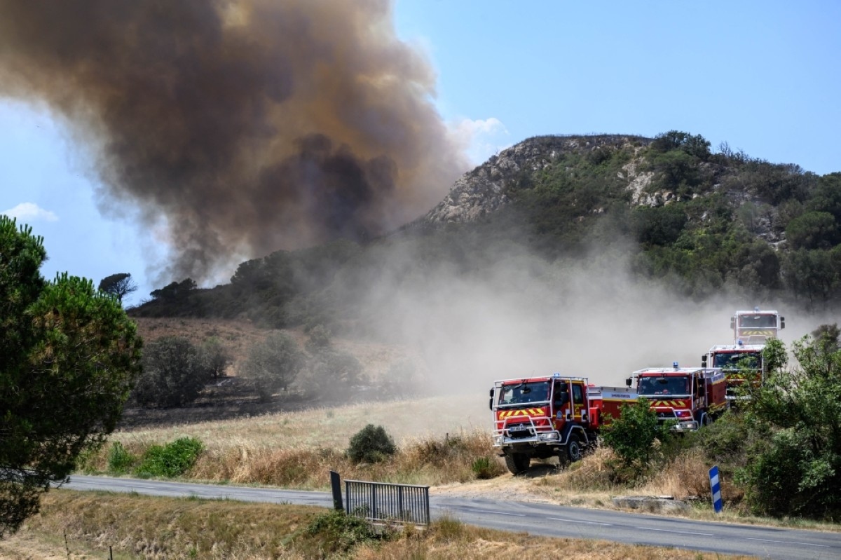 Wildfires burn in Turkey, France as early heatwave hits