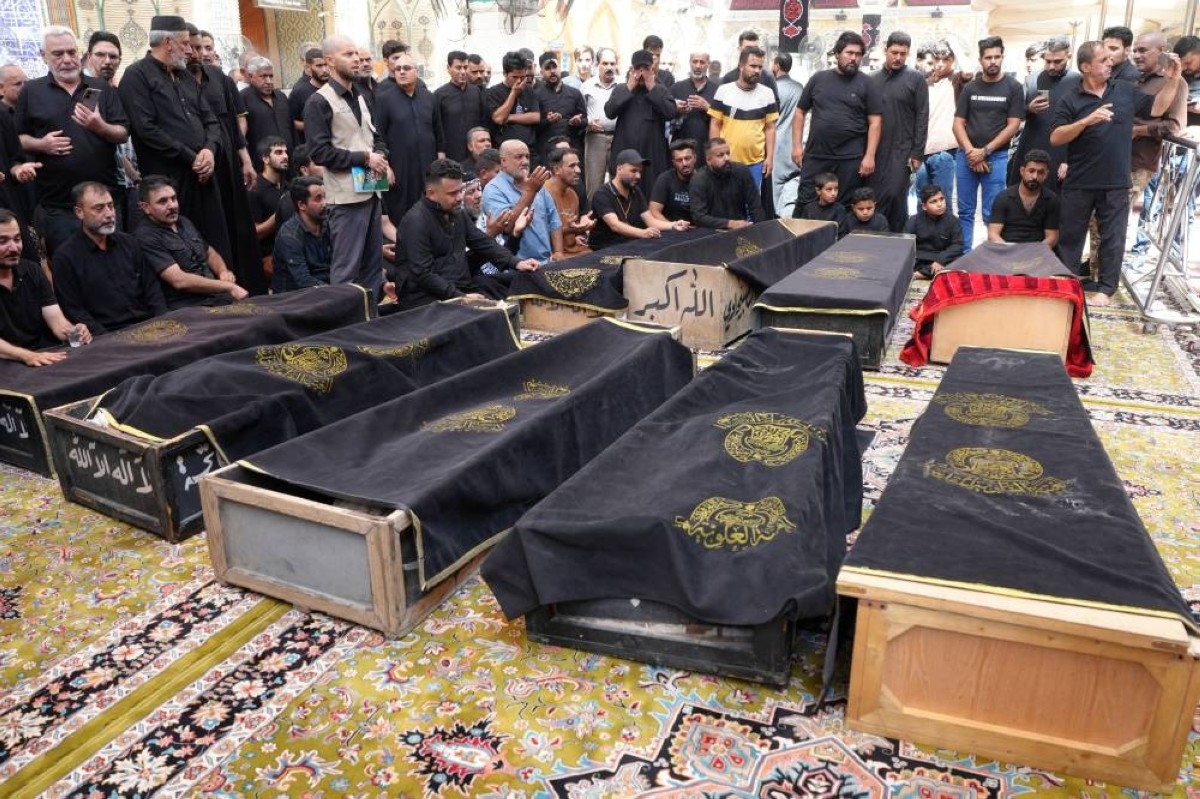Six local officials detained over Iraq deadly mall fire