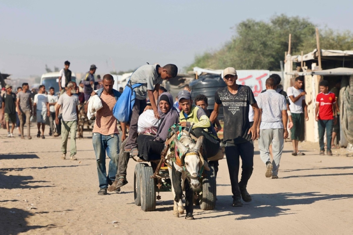 How two families crossed the rubble of Gaza, fleeing war and hunger