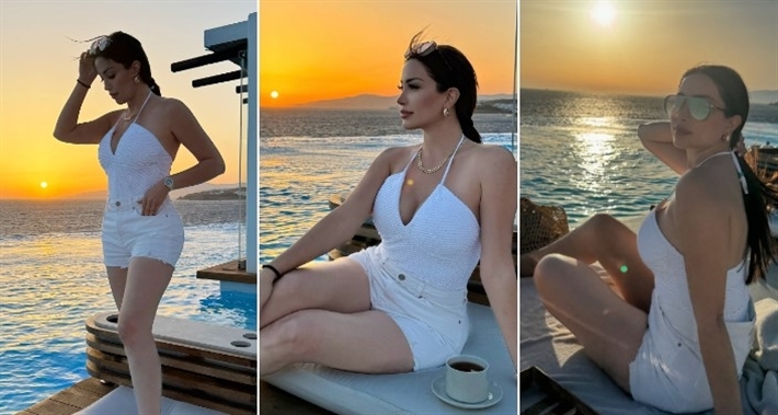 نسرين طافش تضيف للمايوه هوت شورت أبيض في رحلة بحرية
