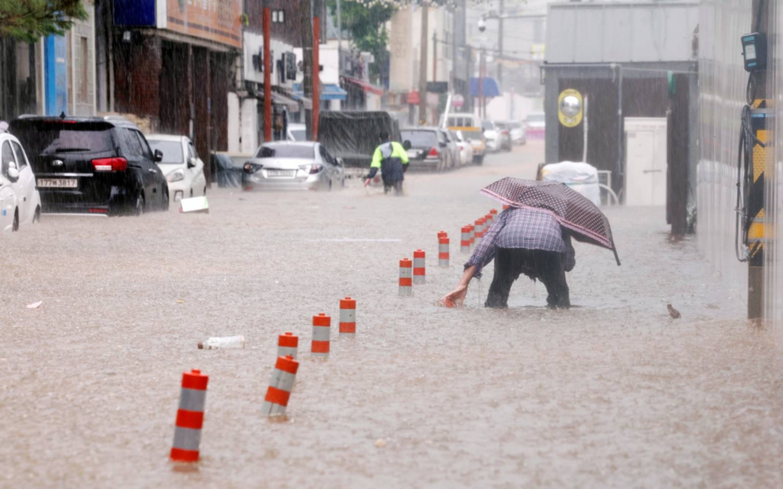 Torrential rain pounds South Korea for third day as thousands take shelter