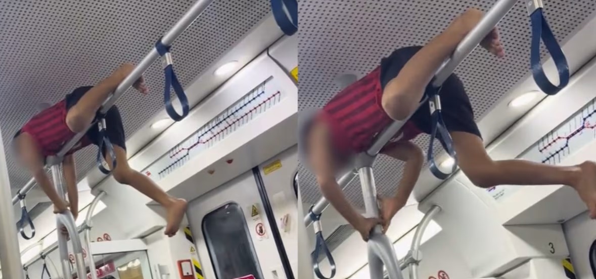 Boy climbs handrail in moving train as father does nothing, despite fellow commuters' unease