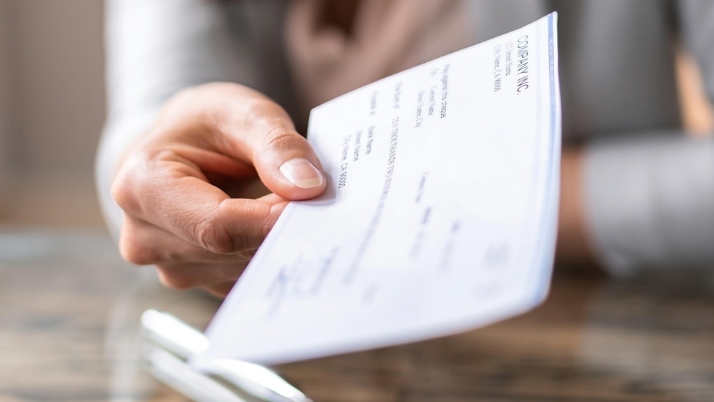 Is Earning $100K/Year In The U.S. 'Easy?' A Project Manager Says It Requires 'Getting Off Your Ass And Doing More Than Working Fast Food'