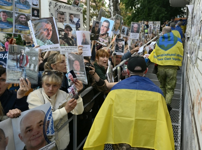 Mothers of missing Ukraine soldiers desperate for hope at POW exchanges