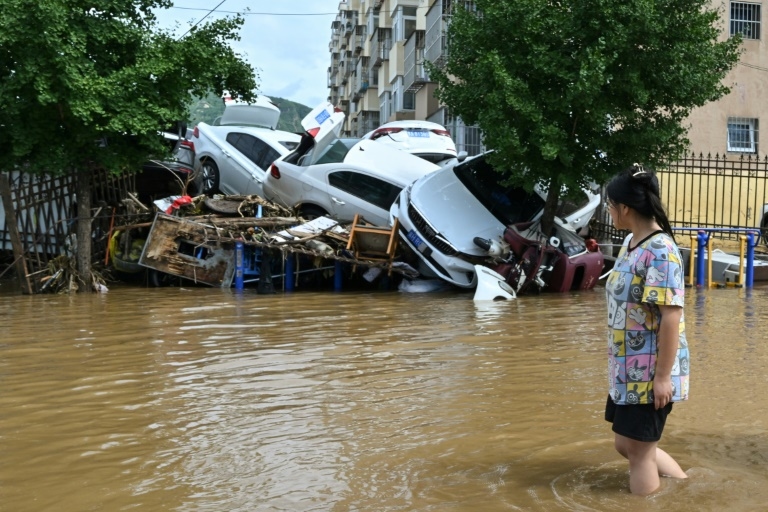 'Once in a hundred years': villagers clean up after deadly China floods