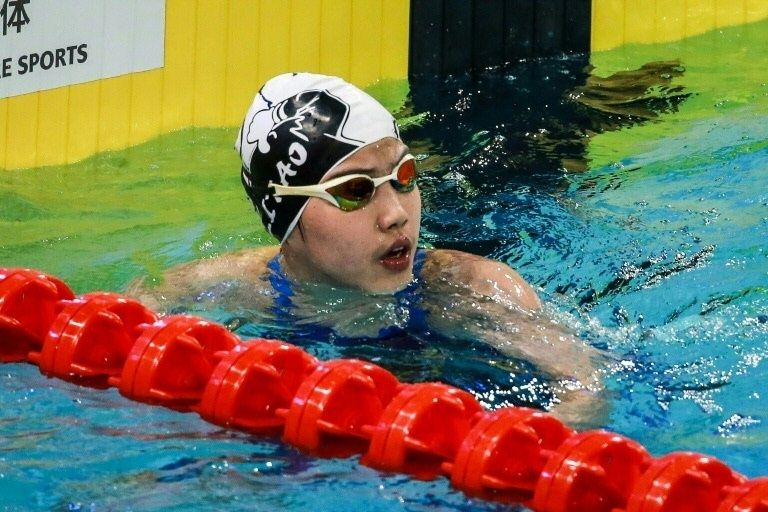 China prodigy takes on swimming world aged 12