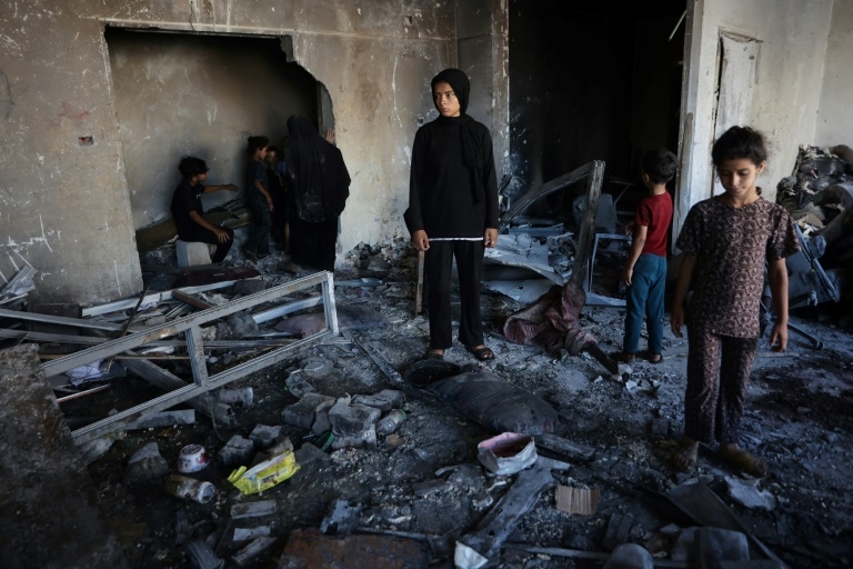 Gaza civil defence says 12 killed by Israeli forces