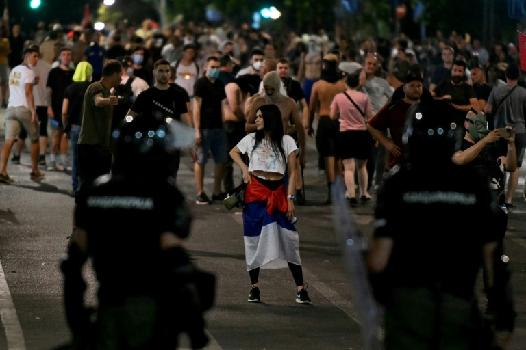 Serbian leader digs in, slams early elections rally