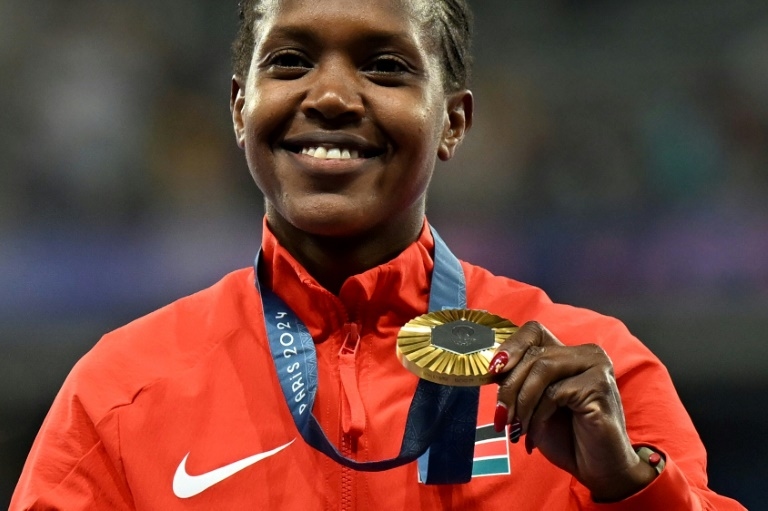 Kenya's Faith Kipyegon breaks women's 1,500m world record