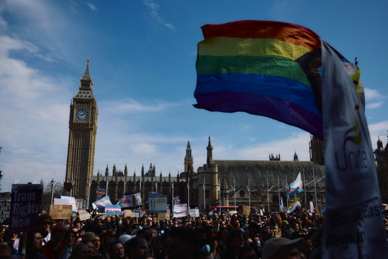 Trans rights supporters rally outside UK parliament after landmark ruling