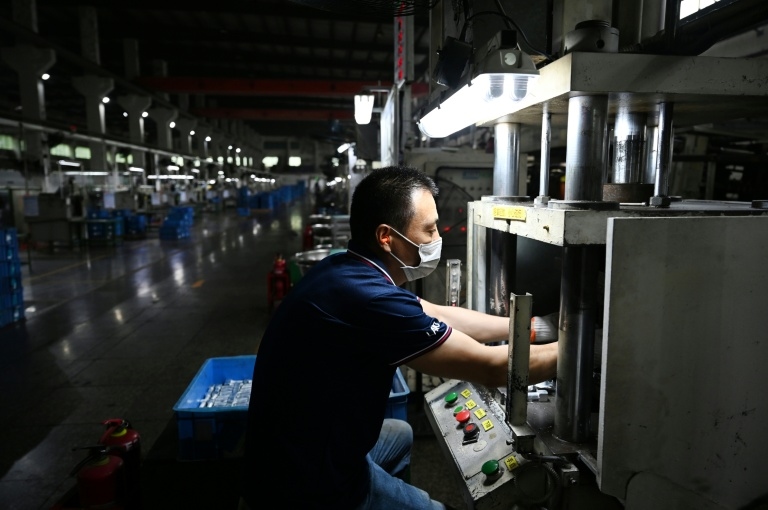 China manufacturing shrinks in June despite trade war respite