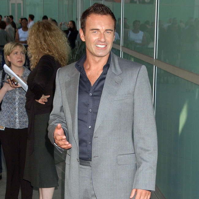 Nicolas Cage hails 'kind and intelligent' Julian McMahon