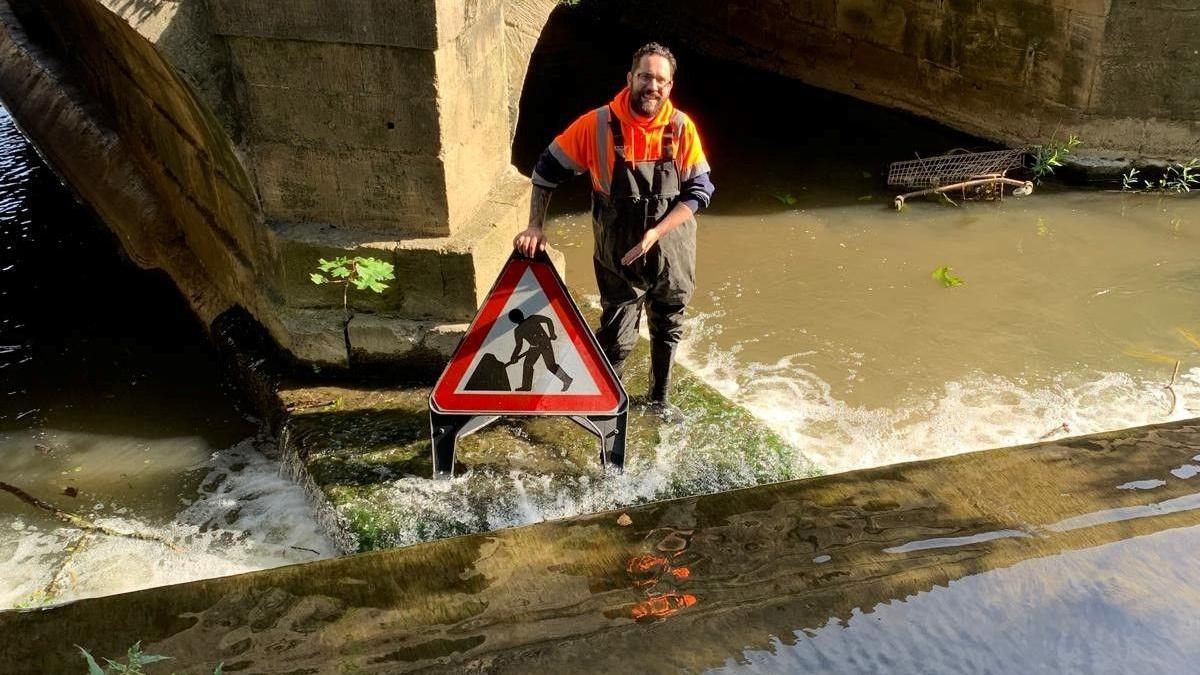 'Deep concern' over signs and trolleys in river