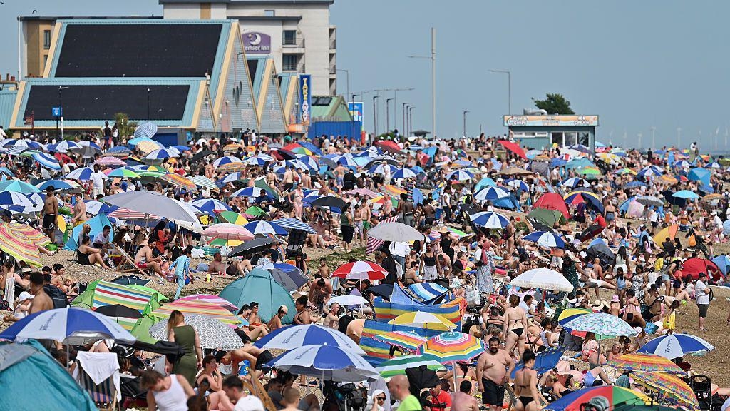 Heat health alerts issued across England as heatwave grips UK