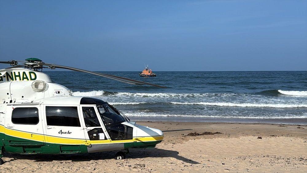Girl, 13, in hospital after being pulled from sea
