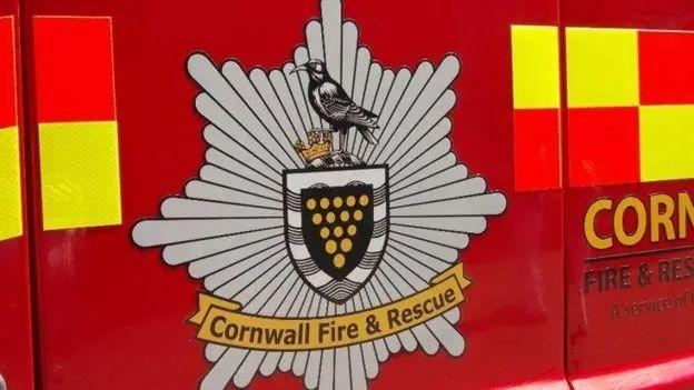 Car fire ignites moorland blaze near A30