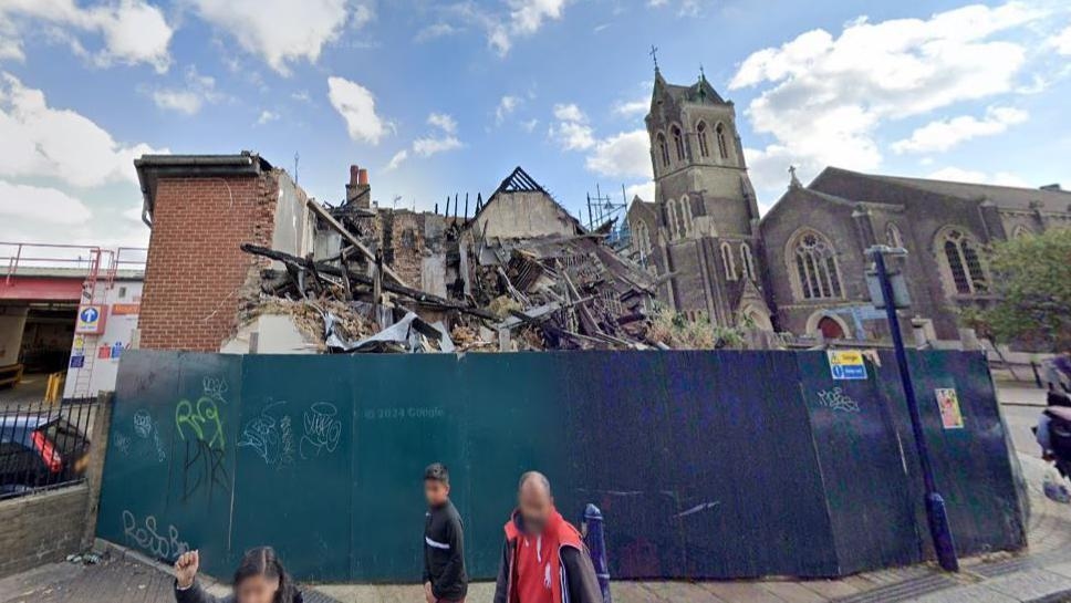 Owners of fire-ravaged pub told to improve site