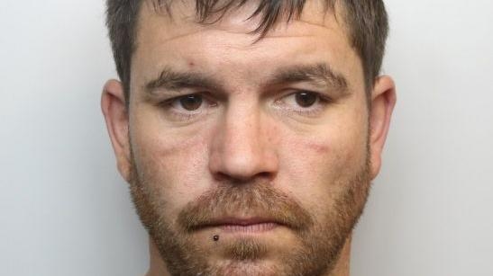 Man who harassed woman is jailed for two years