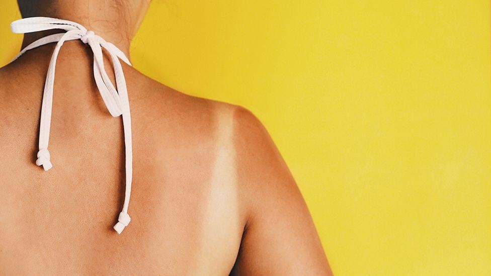 Tan lines are back in fashion. But can you get the look safely?
