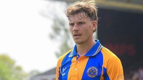Colchester sign Shrewsbury midfielder Gape