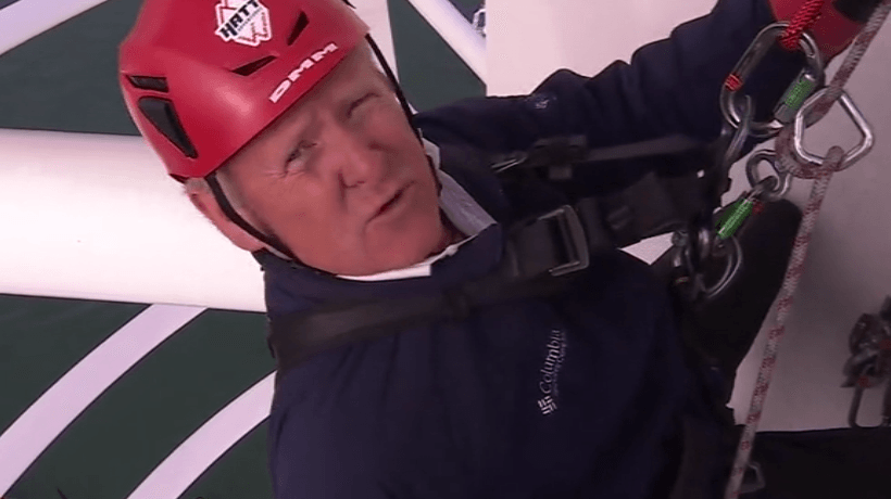 Reporter descends tower landmark on live TV