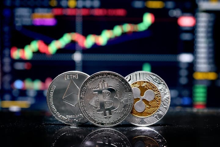 Bitcoin, Ethereum, XRP, Dogecoin Turn Green As Trader Warns That 'Decision Time Is Near'