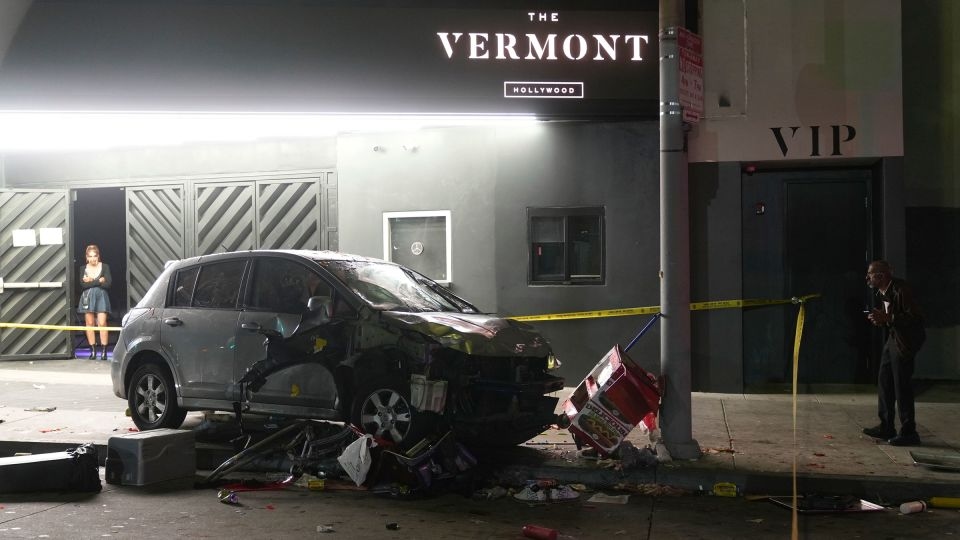 After plowing his car into a crowd outside an LA nightclub, the driver was beaten and shot by bystanders, police say