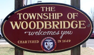 Message board on top of a 56-foot pole may be looking down on Route 1