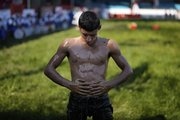 Photos show Turkey's youngest oil wrestlers keeping a 14th-century tradition alive
