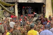 Photos show the aftermath after a training jet crashed into a school campus in Bangladesh