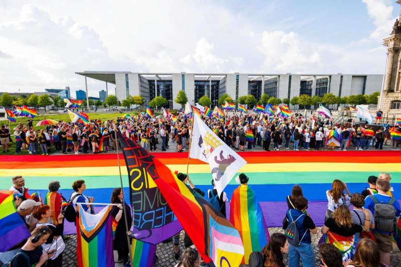 Massive rainbow flag placed at Reichstag by activists ahead of Pride