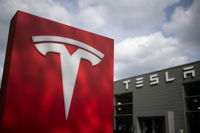 Tesla reports second-quarter profit decline amid delivery drop