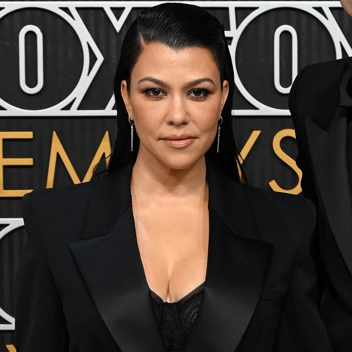 Kourtney Kardashian Bares Her Bottom in Cheeky Black Dress