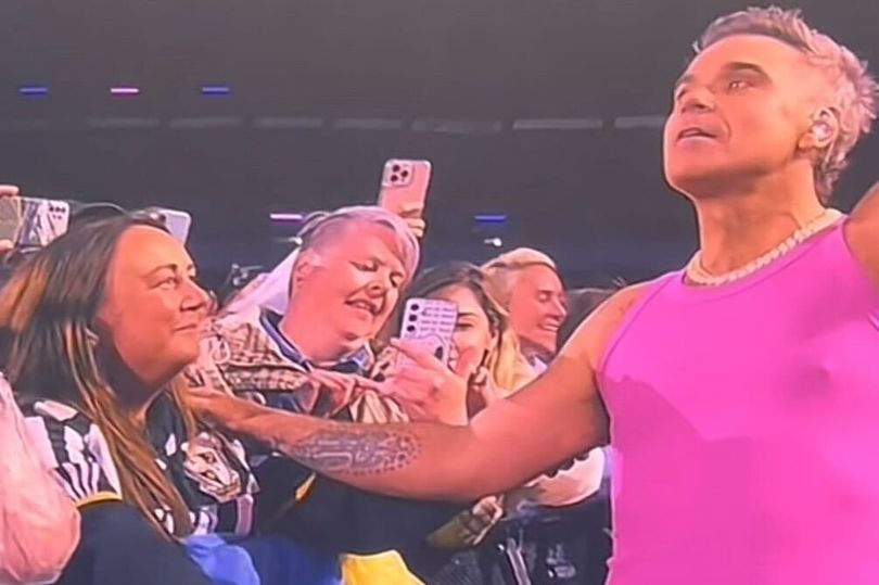 Lotto winner Jane Park makes cheeky jibe as Robbie Williams song choice divides crowd