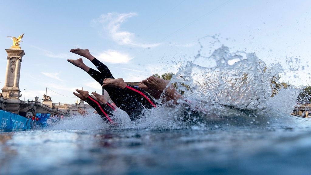 Clean enough for a dip? Paris set to reopen the Seine for swimming, but locals aren't so sure