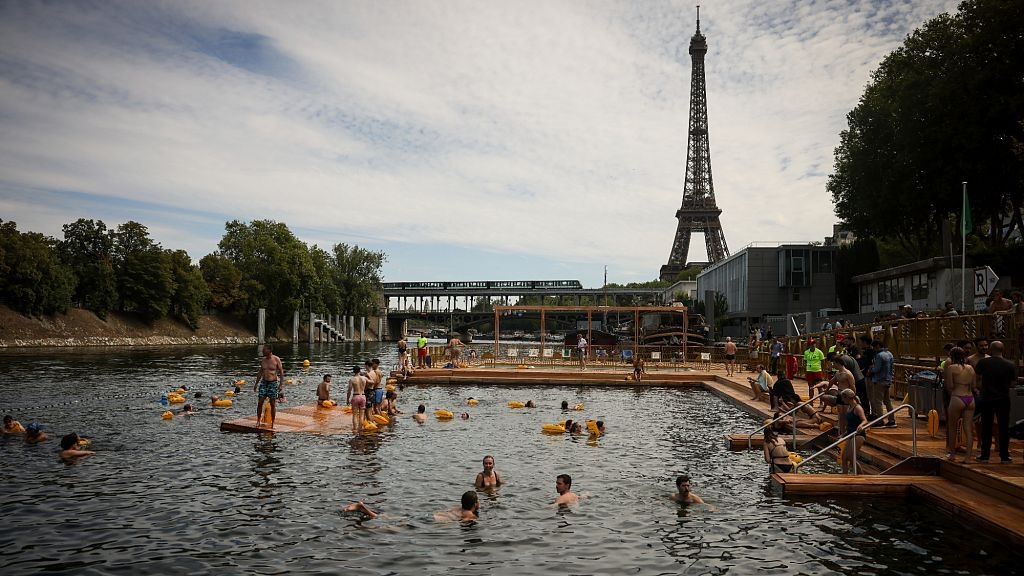 Parisians take a historic plunge into the River Seine after more than a century