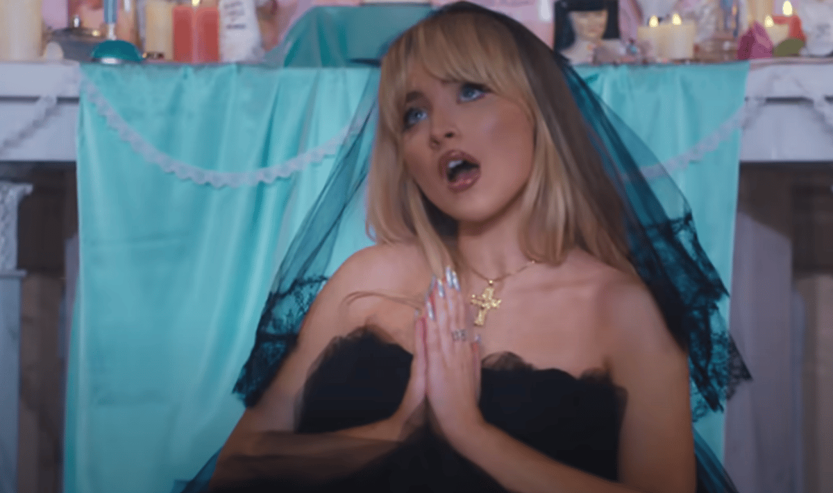 Sabrina Carpenter releases a demure album cover she says has been 'approved by God'
