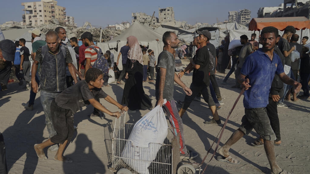 Israeli military to pause fighting in 3 Gaza areas amid warnings of famine