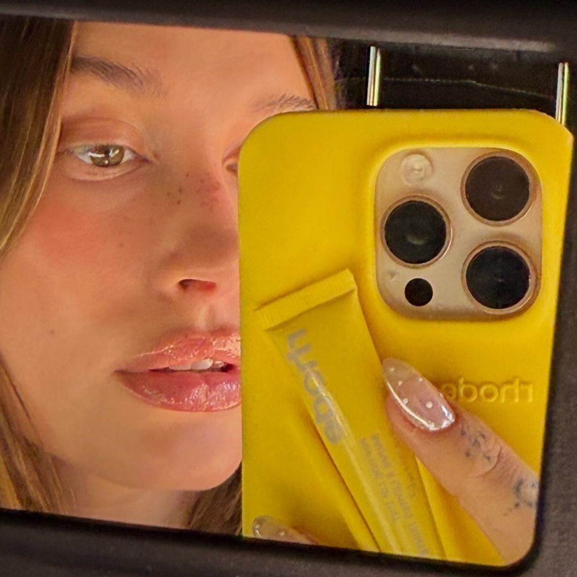 Hailey Bieber's Glass Polka Dot Manicure Adds the Cutest Twist to the Bare Nail Trend